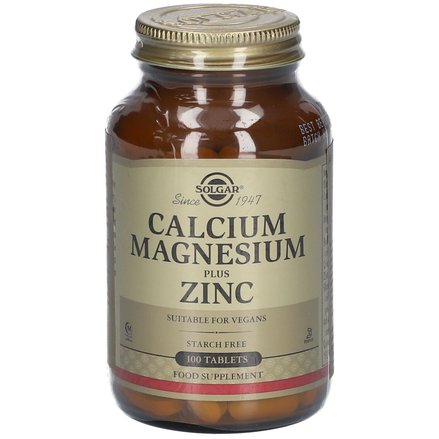 Retro di un flacone di vetro marrone con coperchio dorato. Testo in tedesco. Contiene ingredienti e istruzioni per l'uso.