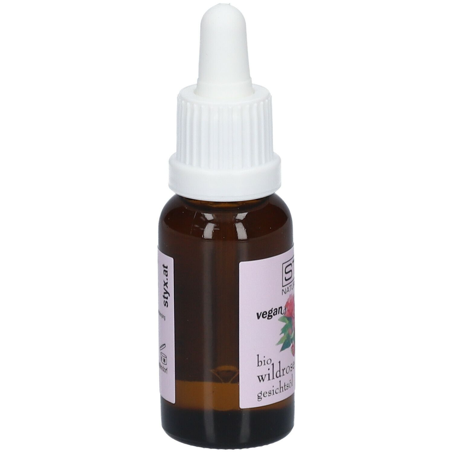 Flacone di vetro marrone con contagocce bianco. Etichetta con logo STYX, illustrazione di rosa selvatica e testo. Sigillo vegano.