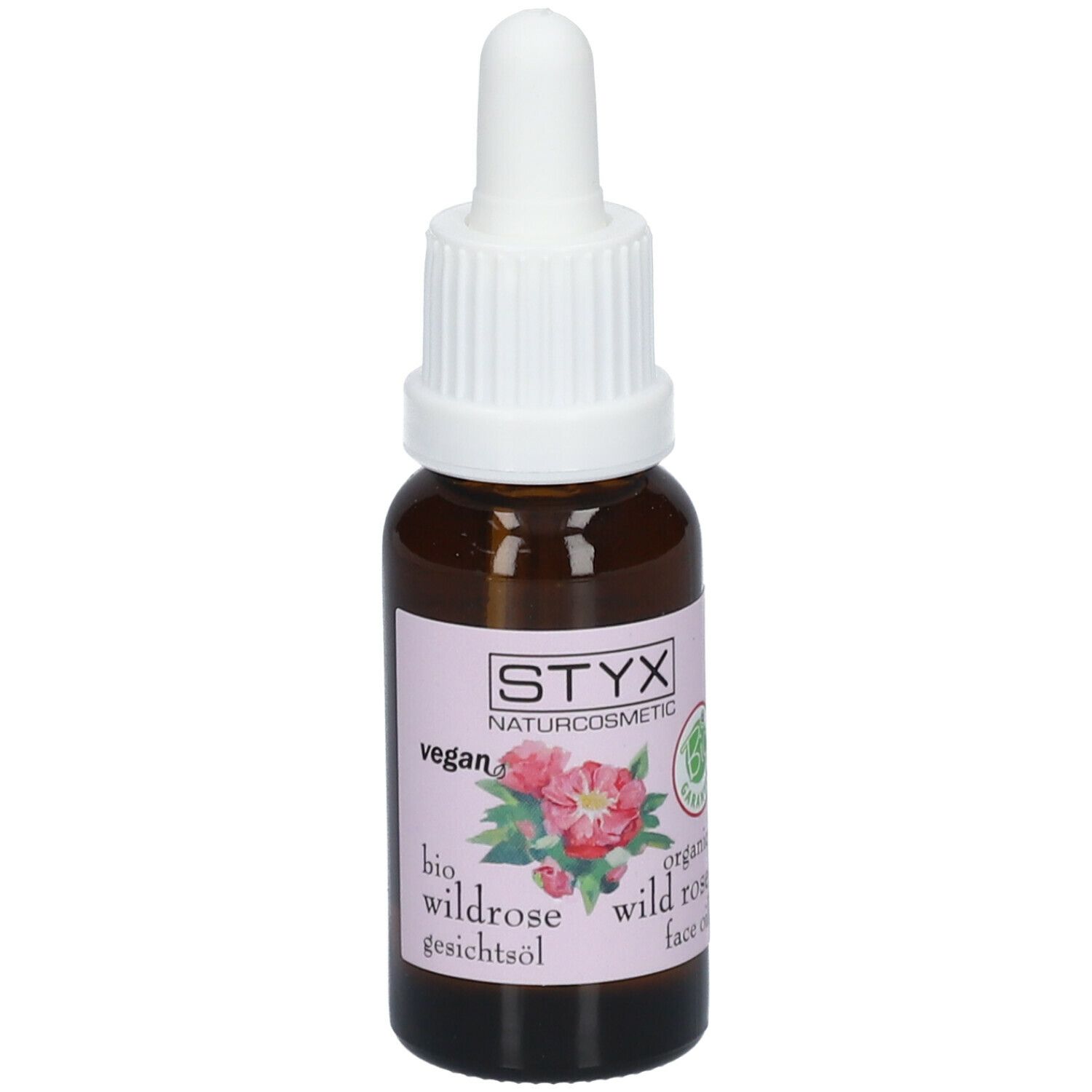 Flacone di vetro marrone con contagocce bianco. Etichetta con logo STYX, illustrazione di rosa selvatica e testo. Sigillo vegano.