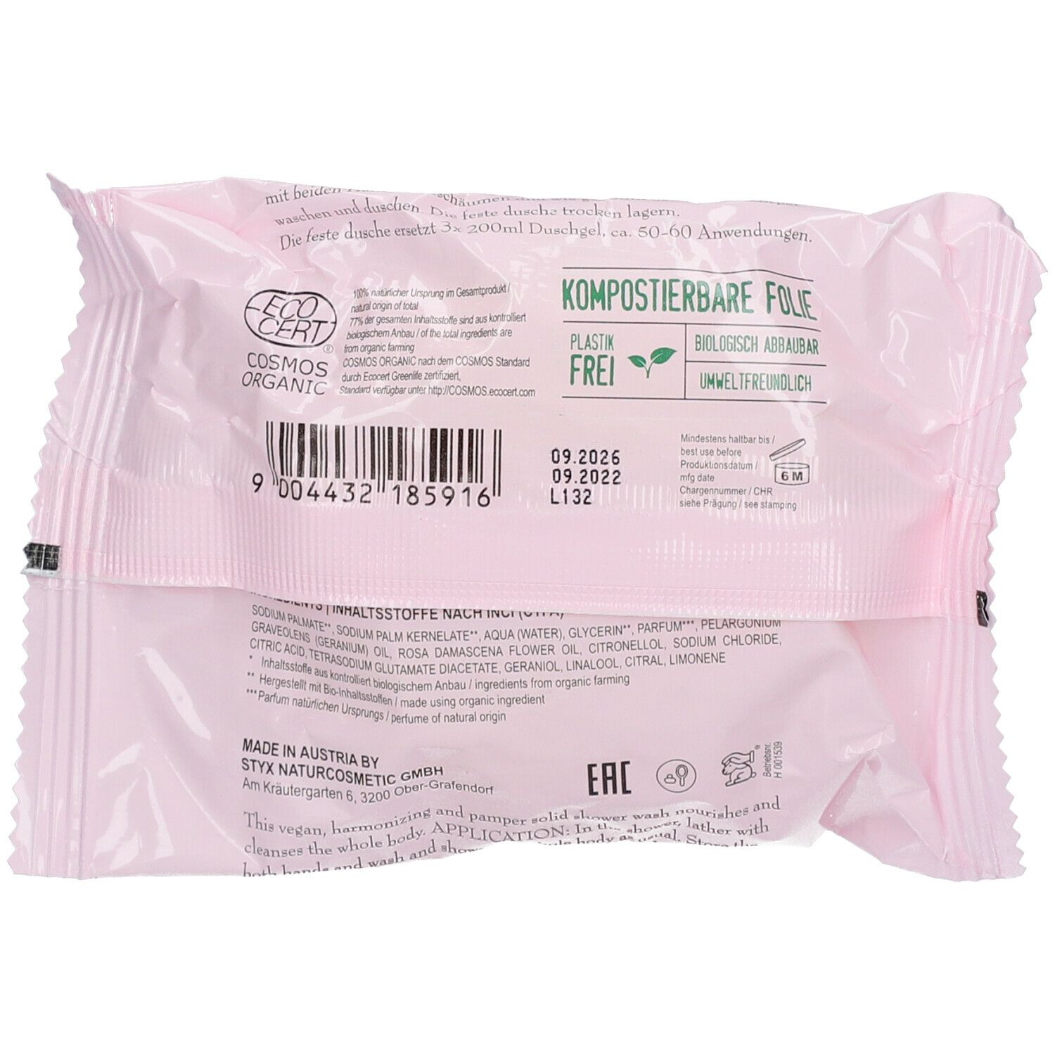 Retro della confezione rosa con testo, codice a barre, certificazione Cosmos Organic e informazioni sulla pellicola compostabile.