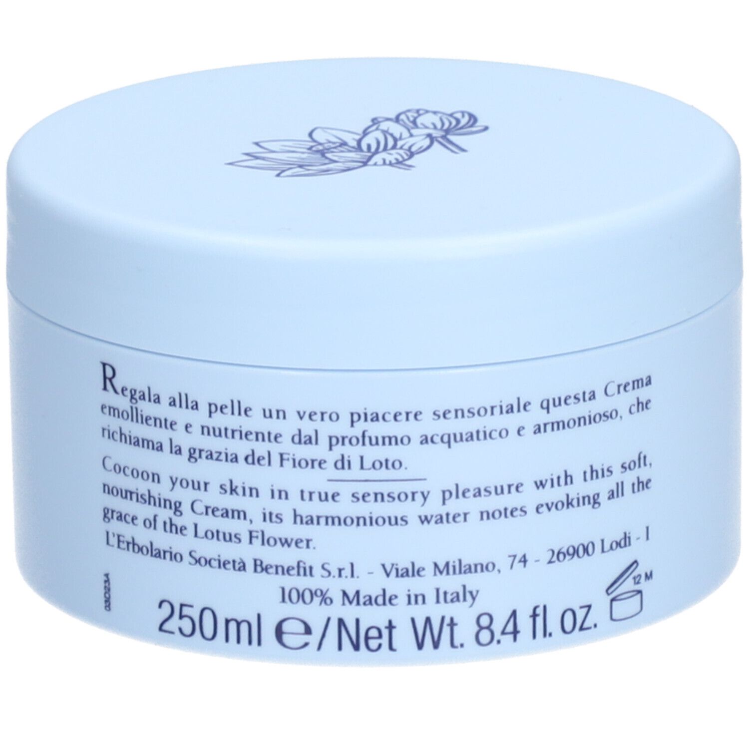 Vaso di crema azzurro chiaro. Scritta: L'ERBOLARIO, ALBA IN ASIA, CREMA PROFUMATA PER IL CORPO, DAWN OVER ASIA. Testo in italiano e inglese.