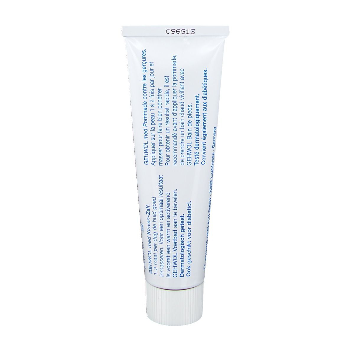 Retro di un tubetto di crema. Testo in tedesco, francese e olandese. Sfondo bianco.