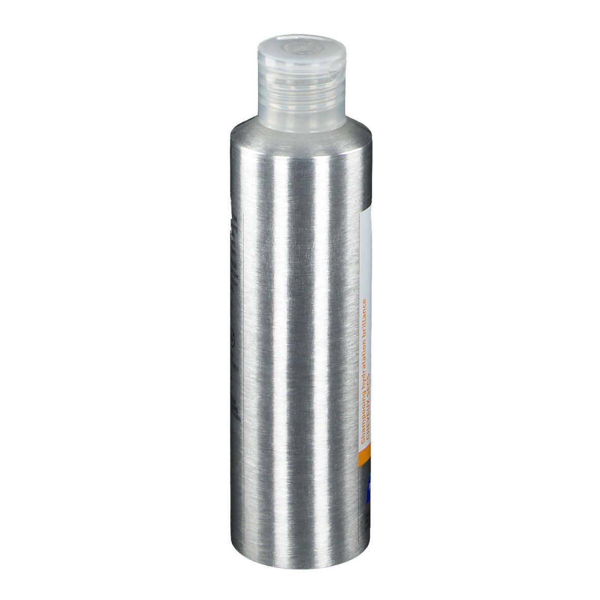 Flacone di shampoo argentato, vista laterale. Etichetta bianca con testo. Chiusura trasparente.