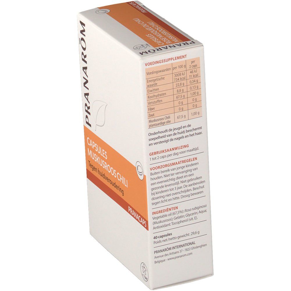 Confezione in cartone con informazioni sul prodotto. Scritta: Pranarom, Capsules Muskusroos Chili, Tegen huidveroudering. Dettagli nutrizionali.