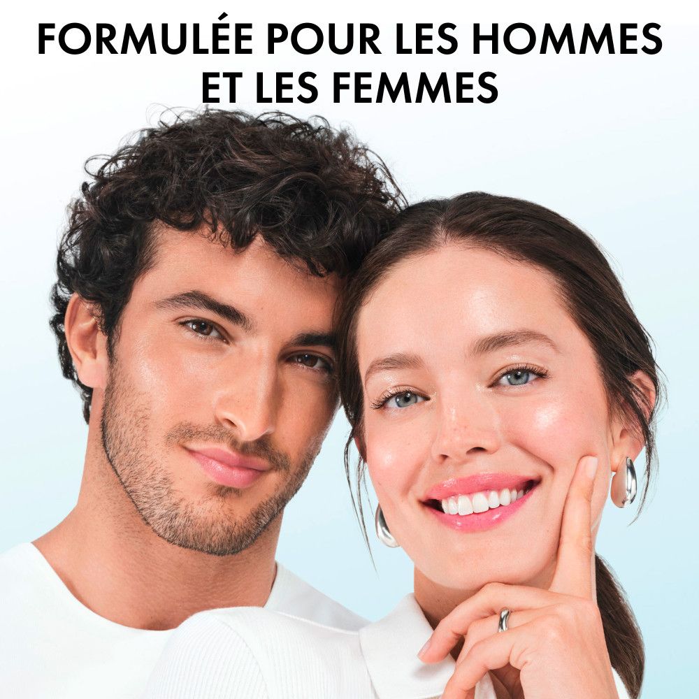 Un uomo e una donna sorridono. Testo: Formulato per uomini e donne.