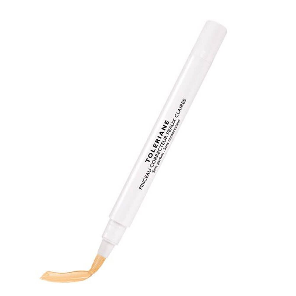 Correttore bianco con punta beige. Scritta: Toleriane, Pinceau Correcteur Peaux Claires.