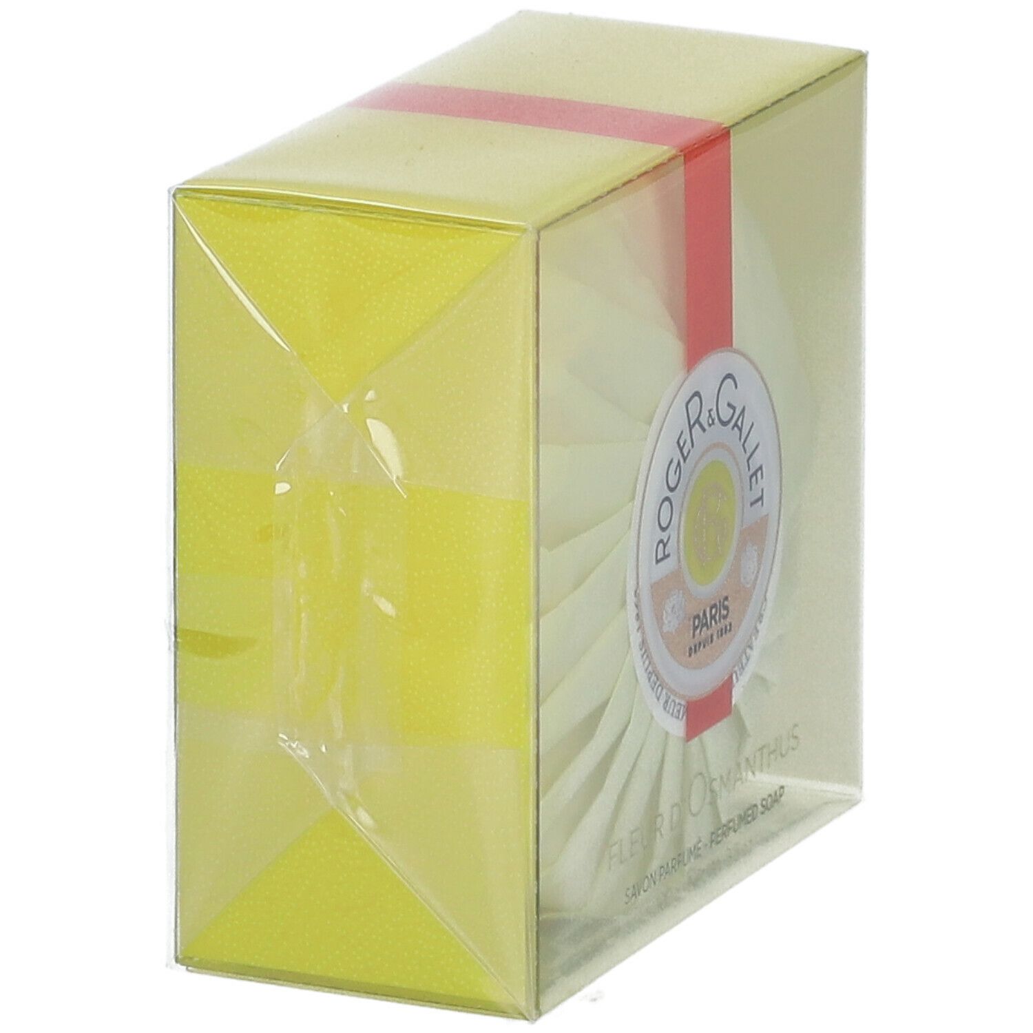 Confezione gialla con sapone rotondo. Nastro rosso. Logo Roger & Gallet. Confezione trasparente.
