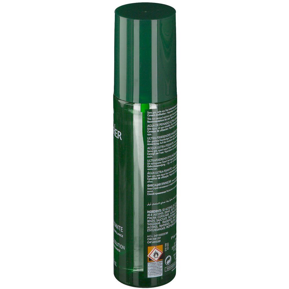 Retro del flacone spray verde. Testo multilingue. Avvertenza: facilmente infiammabile.