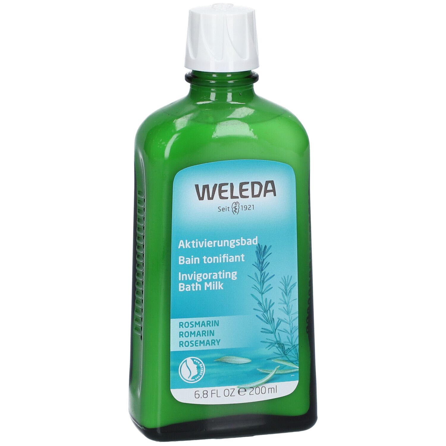 Flacone di vetro verde con tappo bianco. Scritta: WELEDA, Bagno tonificante, Invigorating Bath Milk. Illustrazione rosmarino.