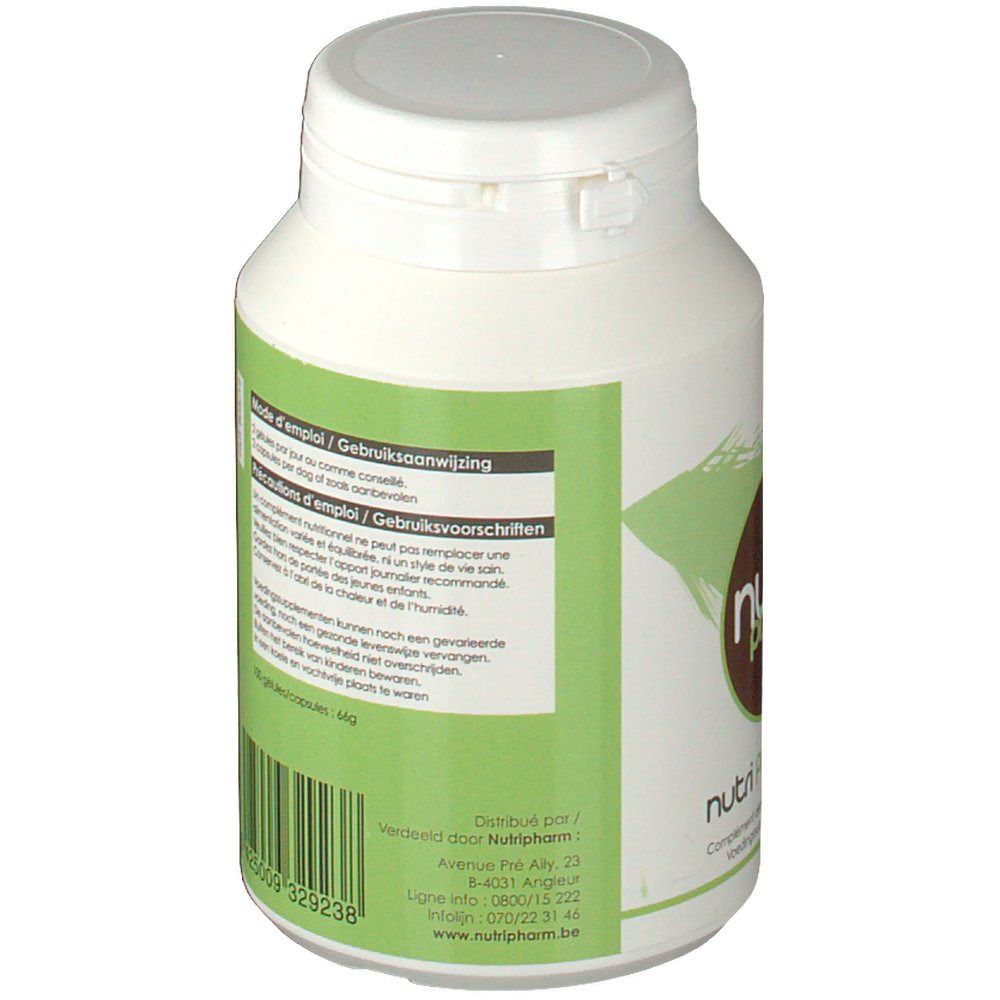 Flacone bianco, etichetta verde con istruzioni per l'uso e indirizzo aziendale. Testo multilingue.