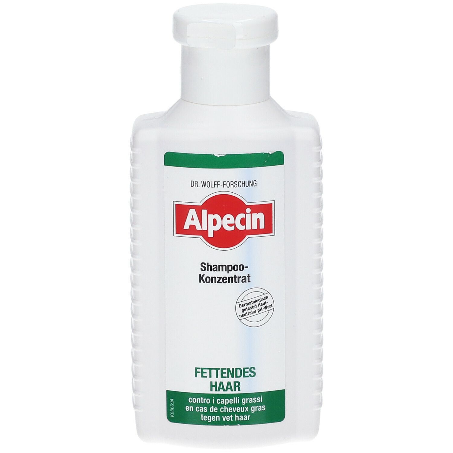 Flacone bianco con etichetta verde e rossa. Scritta: Alpecin Shampoo concentrato per capelli grassi.