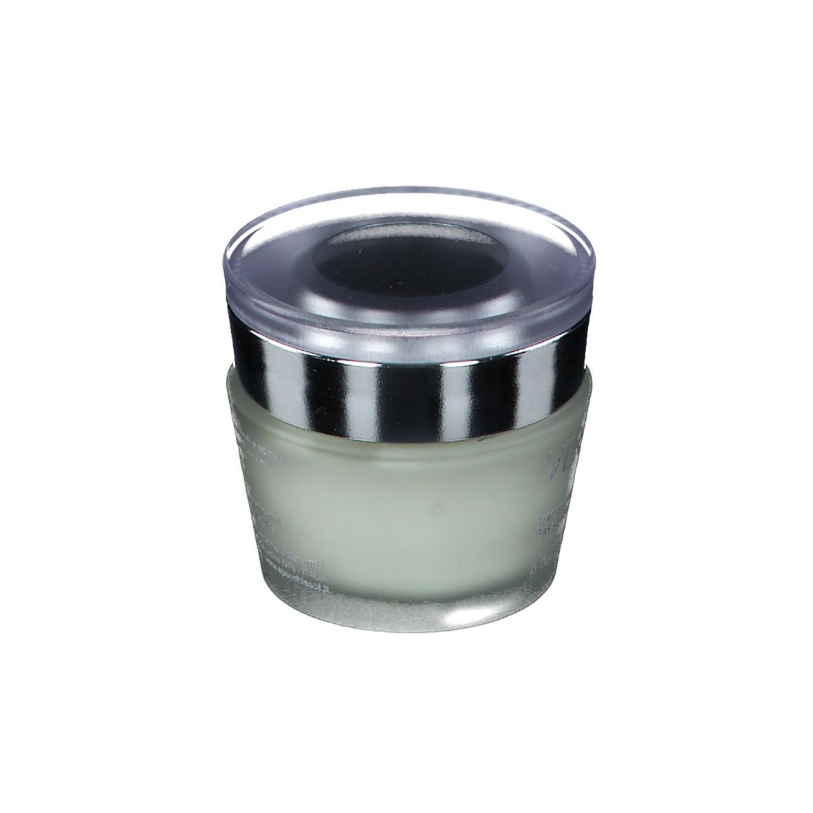 Vaso di crema con bordo argentato e coperchio trasparente. Prodotto parzialmente visibile. Scritta parzialmente leggibile.