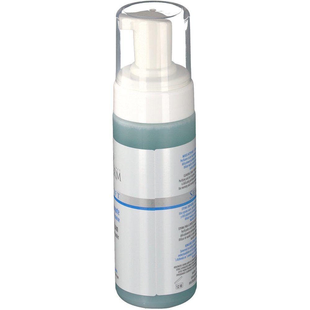 Flacone di mousse detergente con erogatore bianco e tappo trasparente. Liquido blu visibile. Testo: SEADRERM, SEASOFT.