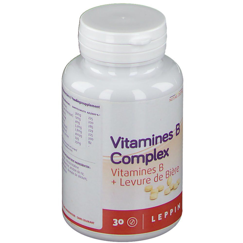 Flacone bianco di vitamine B Complex. Scritta: Leppin, 30 compresse. Compresse visibili.