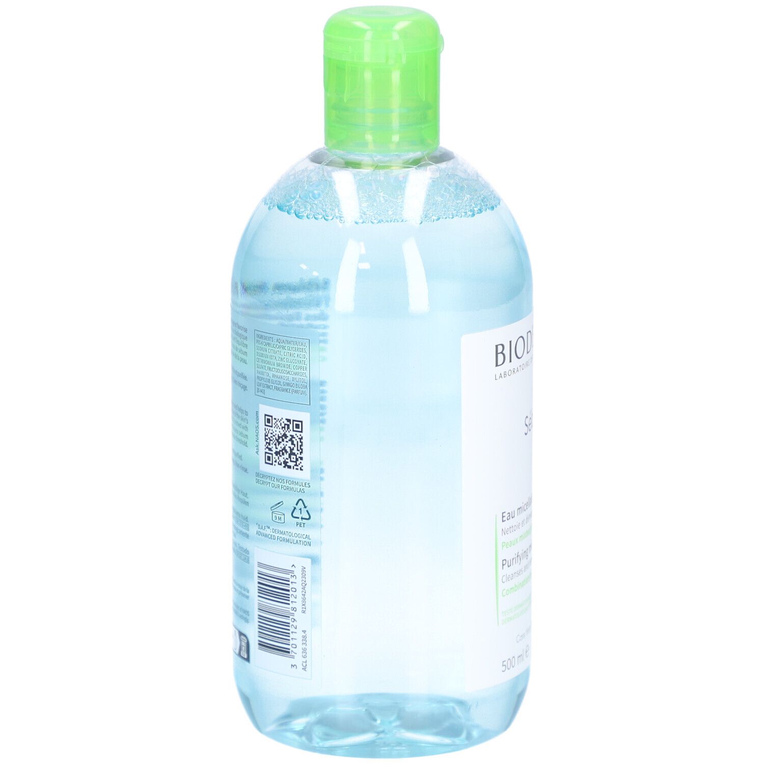 Liquido trasparente in bottiglia trasparente con tappo verde. Etichetta con testo e codice a barre. Vista posteriore.