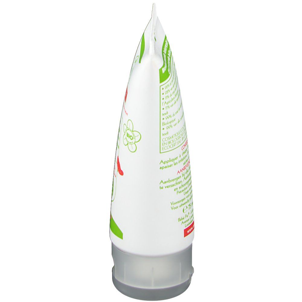 Vista laterale di un tubo bianco con decorazioni verdi e rosse. Chiusura trasparente.