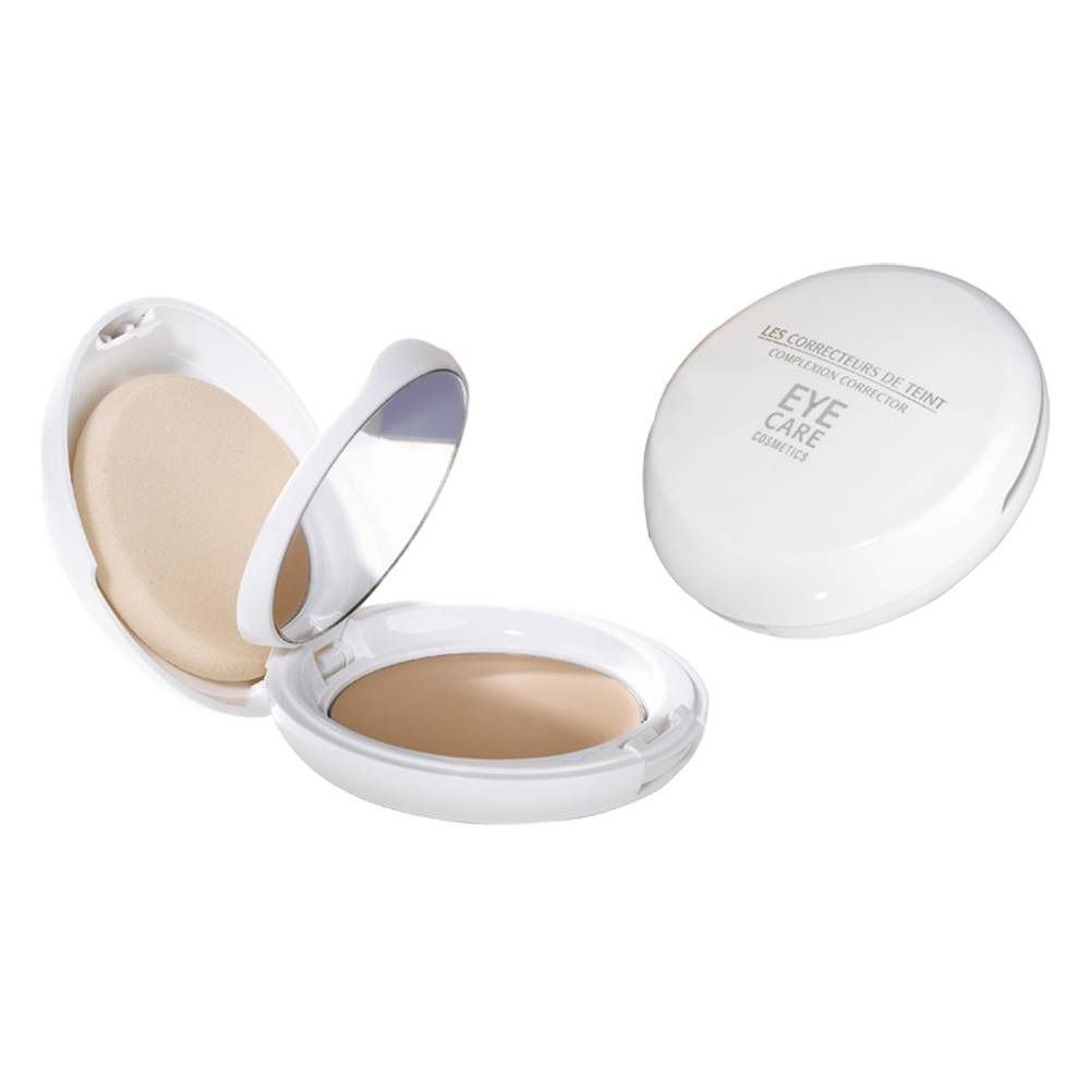 Cipria compatta. Astuccio ovale bianco con specchio e applicatore. Scritta: EYE CARE.