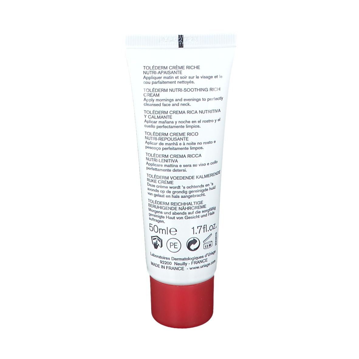 Retro del tubo bianco con tappo rosso. Testo multilingue. Ingredienti e informazioni produttore.