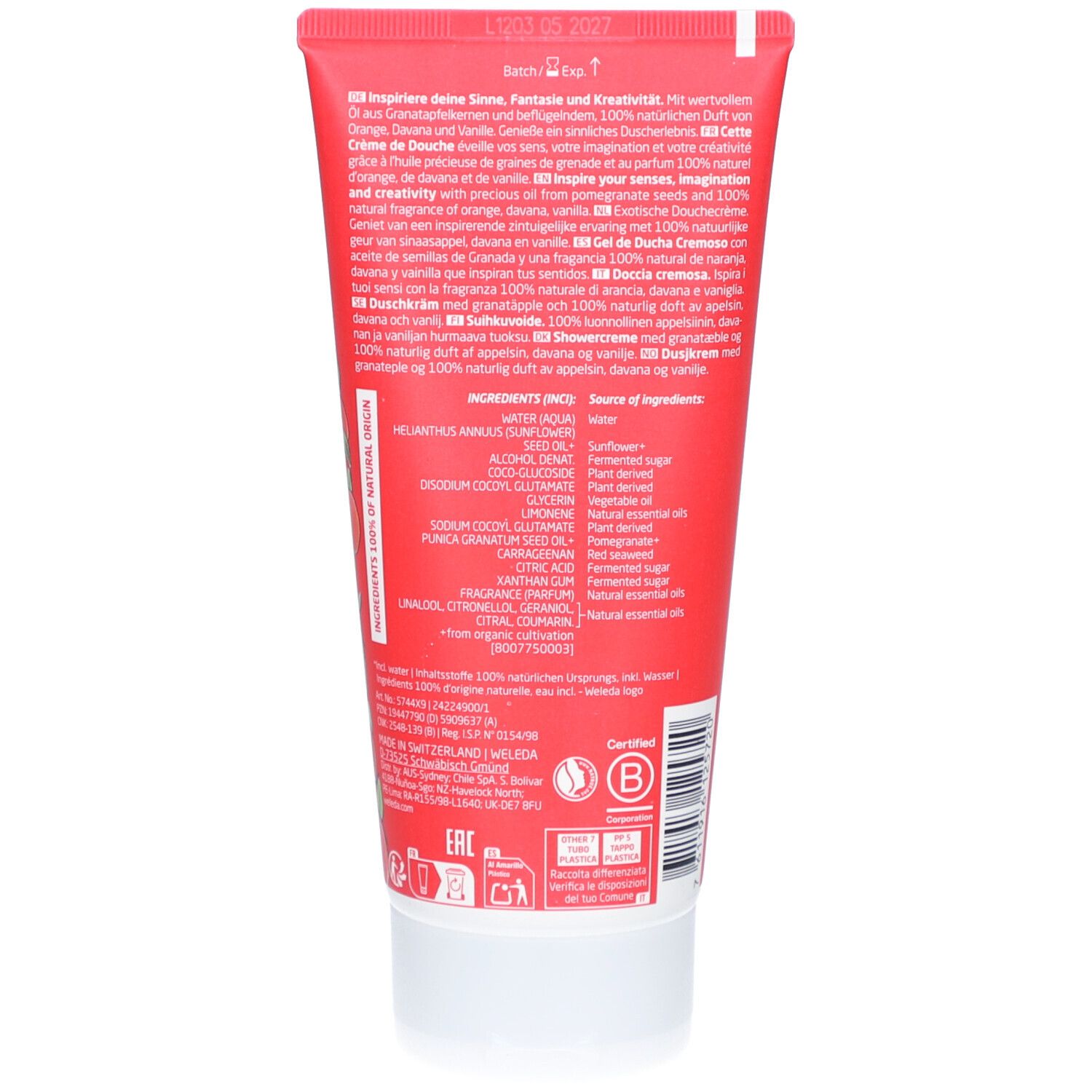 Semi di melograno in una ciotola di vetro. Testo: 100% naturale. Sfondo rosa.