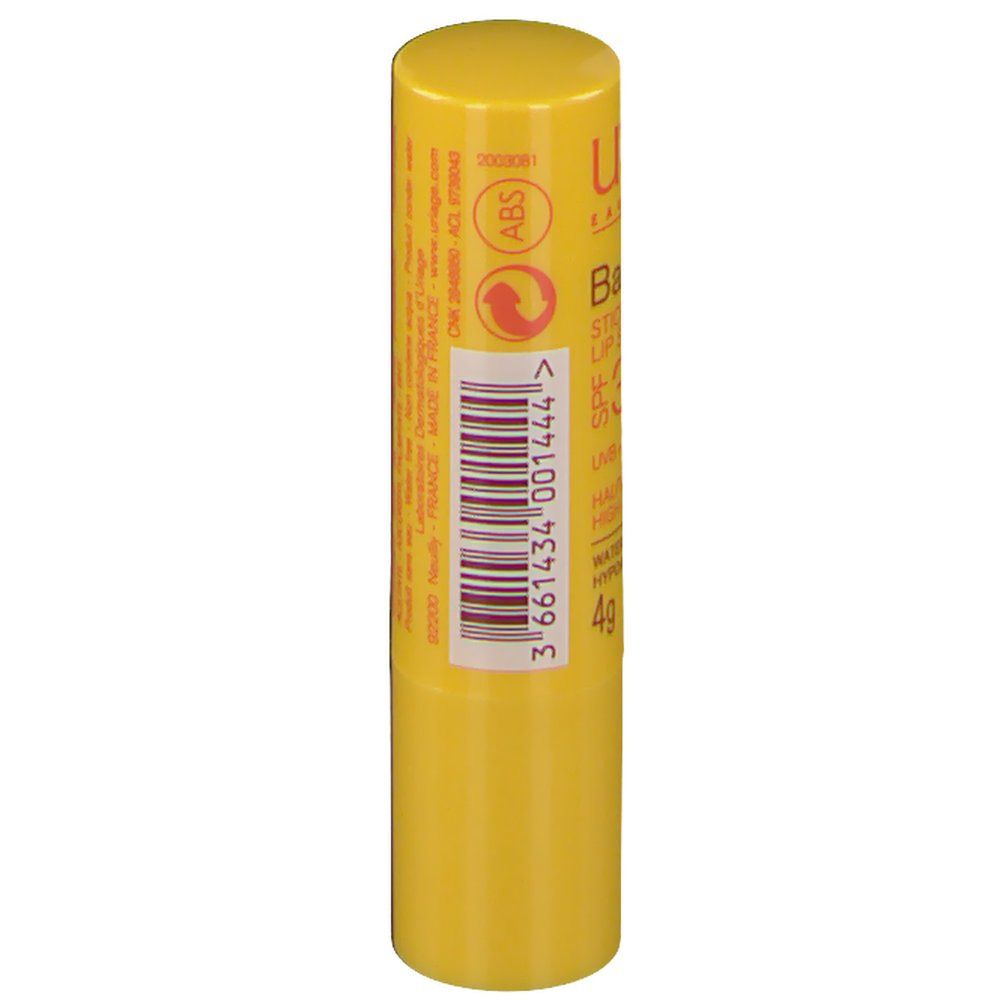 Stick labbra giallo con codice a barre e testo. Contiene informazioni produttore.