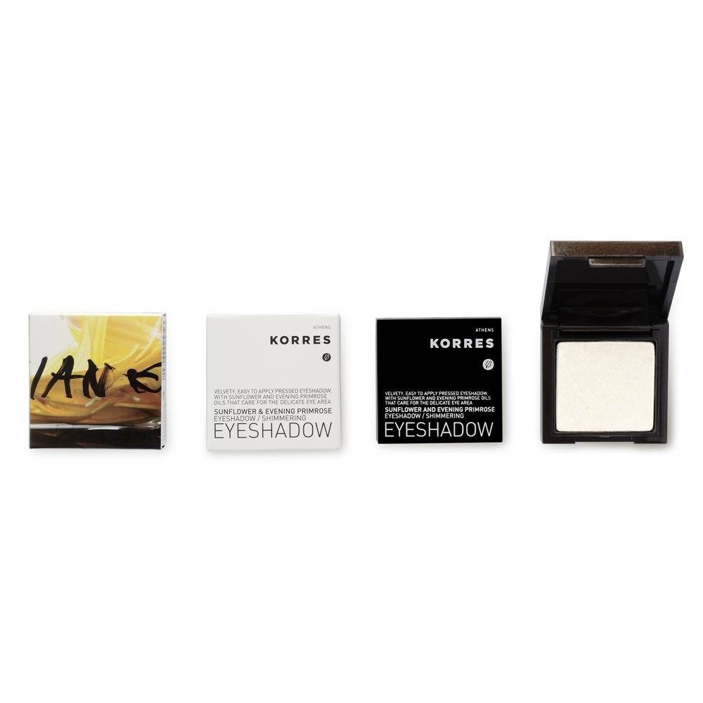 Quattro prodotti affiancati. A sinistra: confezione gialla. Secondo: confezione bianca con testo. Terzo: confezione nera. A destra: ombretto aperto.