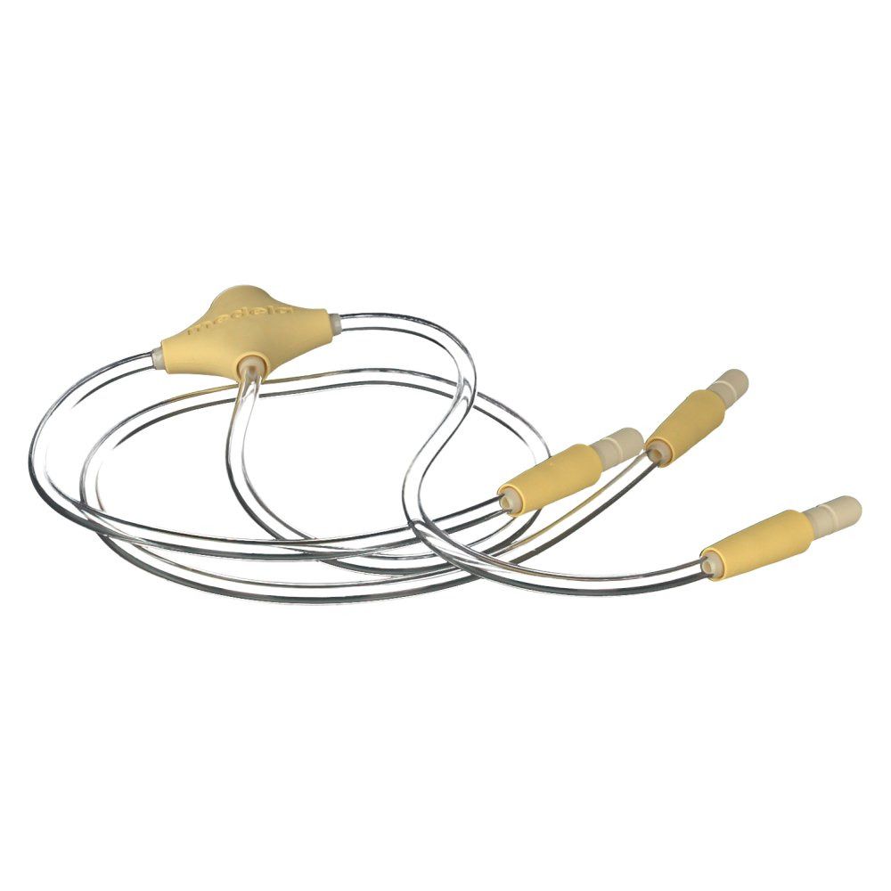 Tubo Medela Freestyle PVC. Tubi in plastica gialla e trasparente con tre connettori.