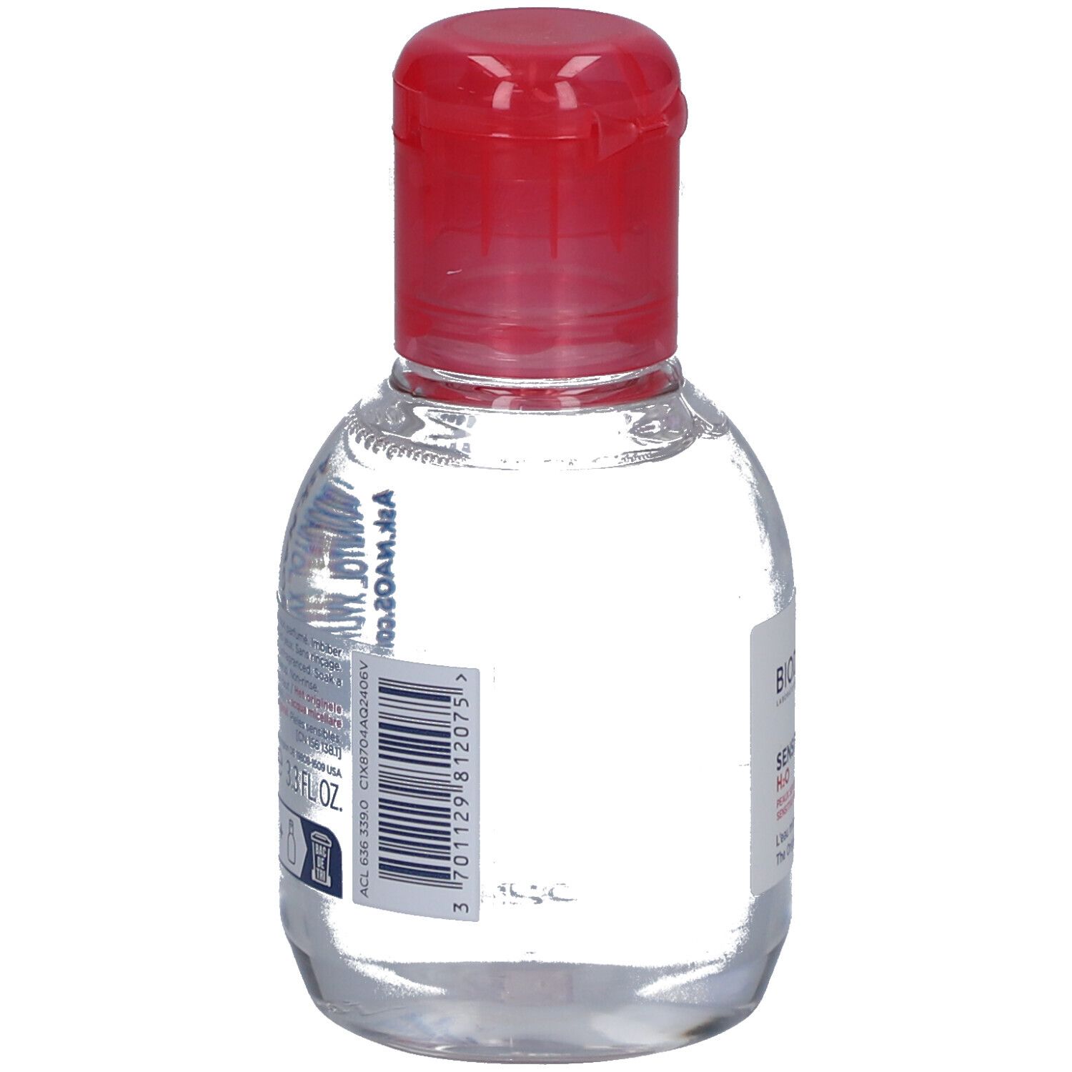 Piccola bottiglia trasparente con tappo rosso. Etichetta con testo e codice a barre. Nome del prodotto non visibile.