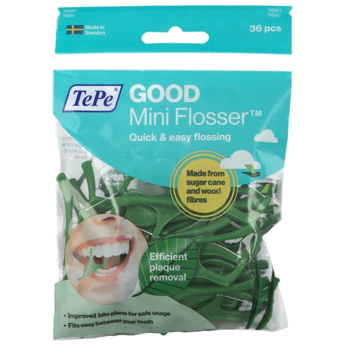 Confezione di TePe Mini Flosser verdi. 36 pezzi. Scritta "GOOD Mini Flosser". Illustrazione di una bocca.