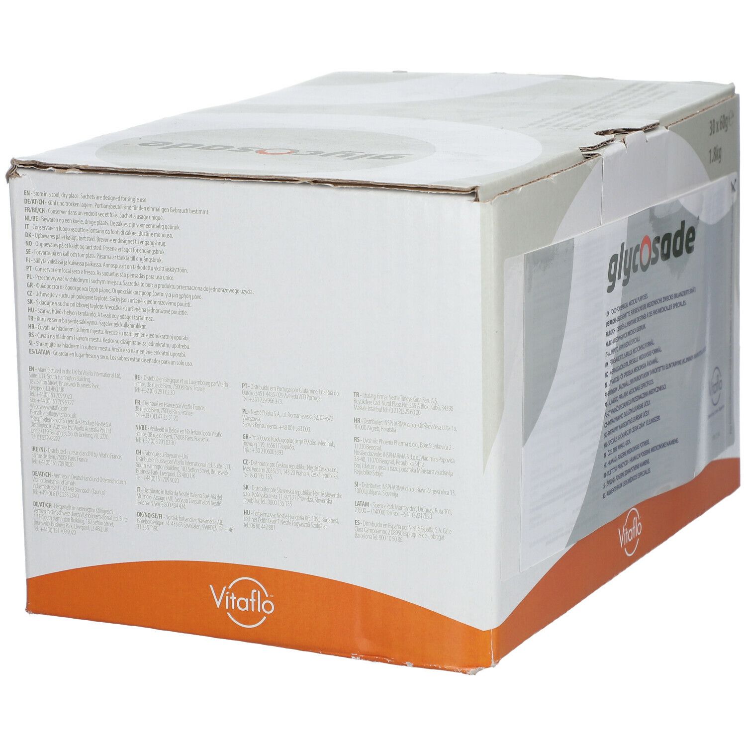 Scatola con "glycosade" e "Vitaflo". Testo multilingue. Striscia arancione in basso.