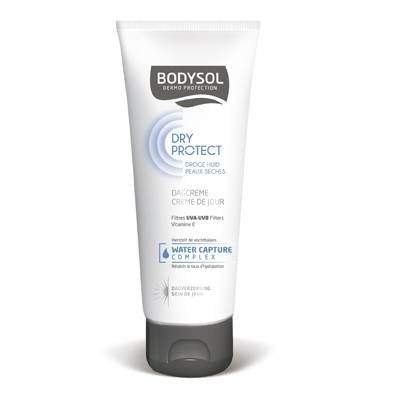 Tubo bianco con logo Bodysol e nome del prodotto. Testo: Dry Protect, Dagcrème, Crème de Jour, Droge Huid, Peaux Seches. Filtri UVA/UVB, Vitamina E. Water Capture Complex.