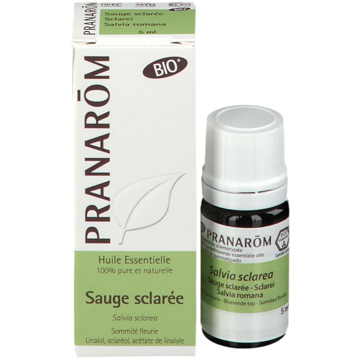 Confezione e flacone. Confezione bianca con fascia verde. Logo PRANAROM. Sigillo « BIO ». Flacone con etichetta.