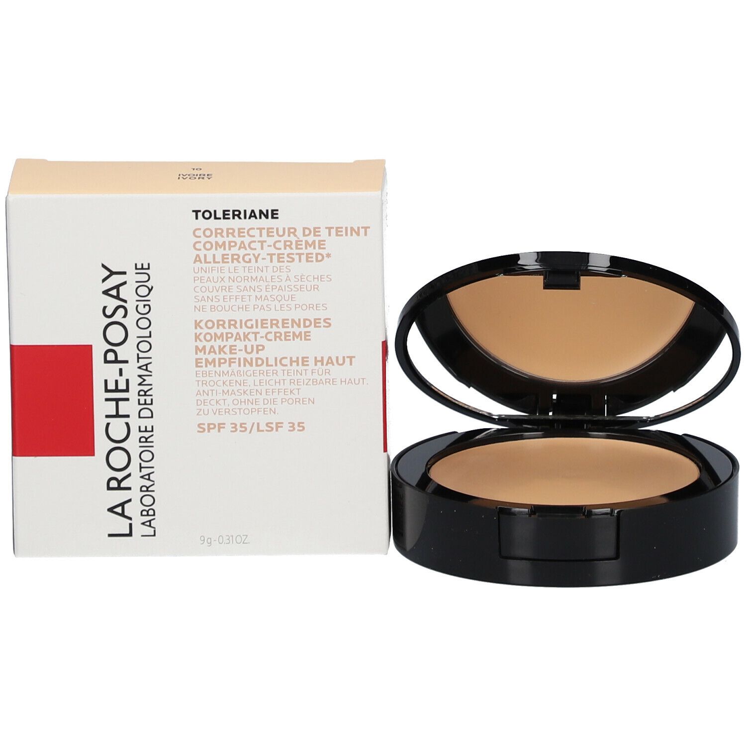 Make-up compatto e confezione. Custodia make-up nera, polvere visibile. Confezione accanto.