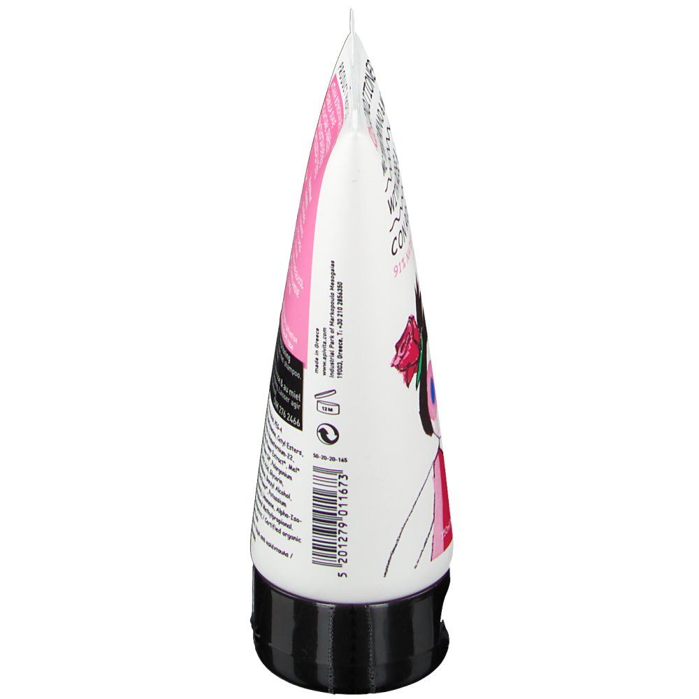 Vista laterale di un tubo bianco con tappo nero. Dettagli rosa e neri. Testo sul tubo.