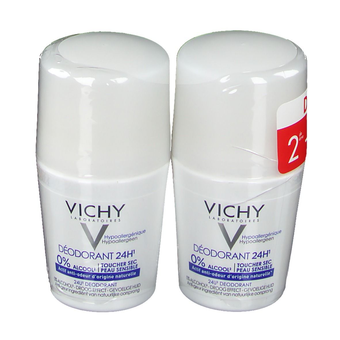 Due deodoranti roll-on bianchi. Marchio VICHY. Scritta: 24H, 0% alcool, pelle sensibile. Confezione trasparente.