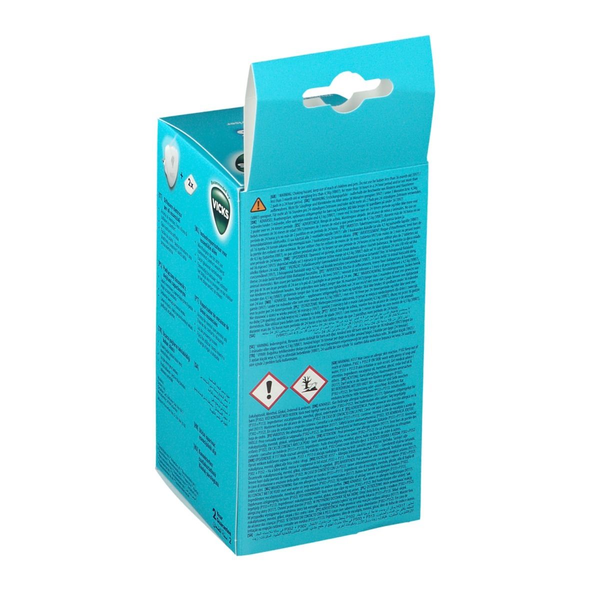 Retro della confezione Vicks Comforting Vapors. Avvertenze e pittogrammi. Testo multilingue.