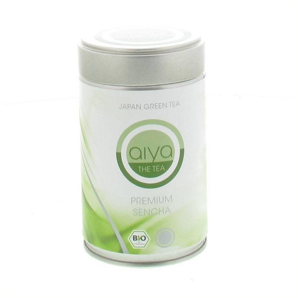 Barattolo cilindrico con coperchio. Scritta: Aiya The Tea, Premium Sencha Bio. Colori verde e bianco. Japan Green Tea.