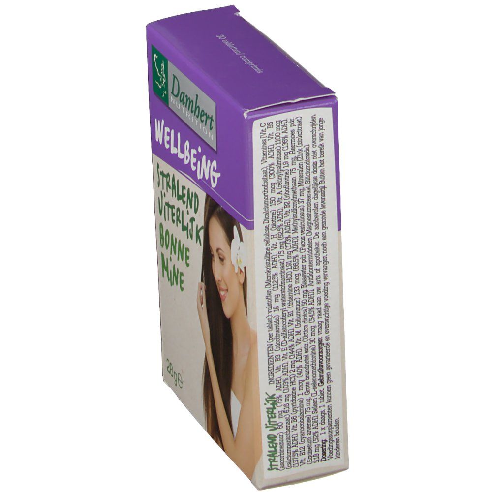 Scatola Damhert Bonne Mine, in diagonale. Coperchio viola, testo verde. Contiene compresse. Scritta: Wellbeing, Stralend, Viterlijk, Bonne Mine. Donna con fiore.