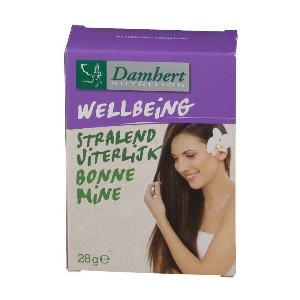Scatola Damhert Bonne Mine. Coperchio viola, testo verde. Contiene compresse. Scritta: Wellbeing, Stralend, Viterlijk, Bonne Mine. Donna con fiore.