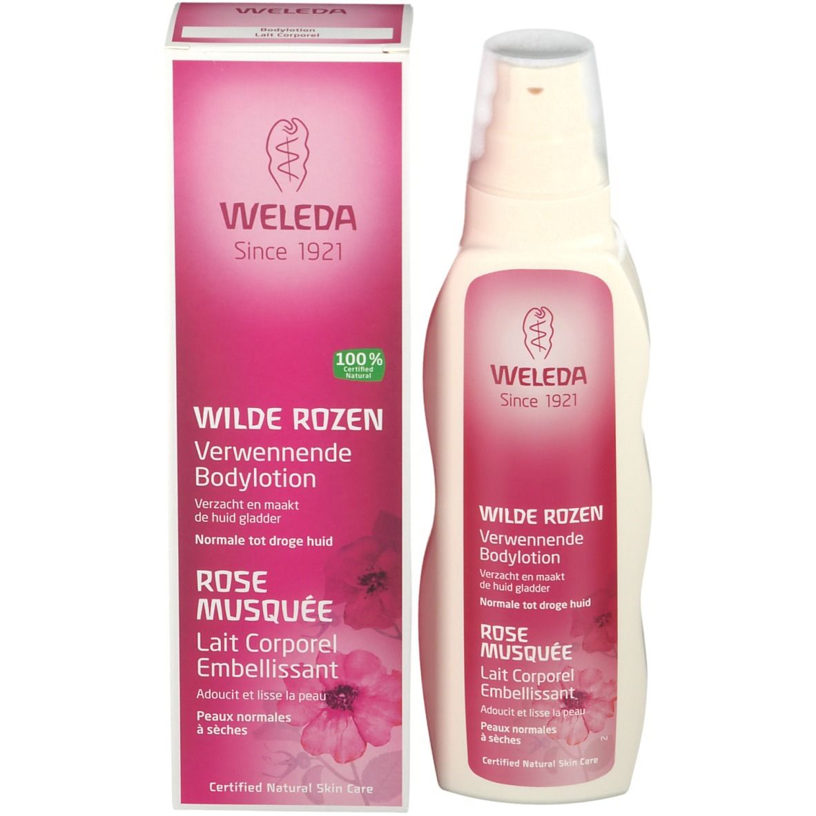 Flacone e scatola di lozione per il corpo Weleda. Flacone e scatola con etichette rosa. Testo: Wilde Rozen, Rose Musquée.