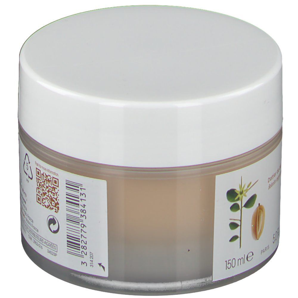 Barattolo di crema con coperchio bianco. Scritta: KLORANE. Testo: 150 ml, codice a barre, codice QR. Illustrazione: dattero del deserto.