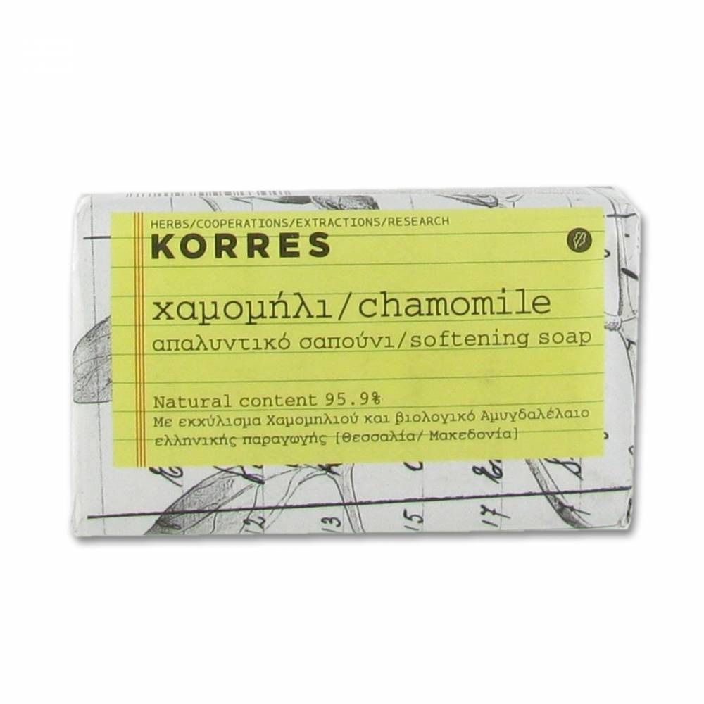 KORRES® Savon Kamille. Sapone avvolto in carta. Etichetta gialla con informazioni e testo greco.
