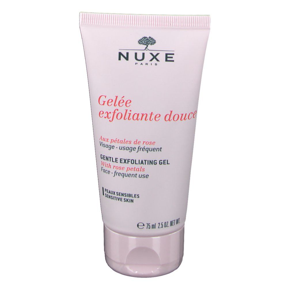 Tubo rosa con logo NUXE e testo. Gelée exfoliante douce. Gel esfoliante delicato con petali di rosa. Per pelli sensibili.
