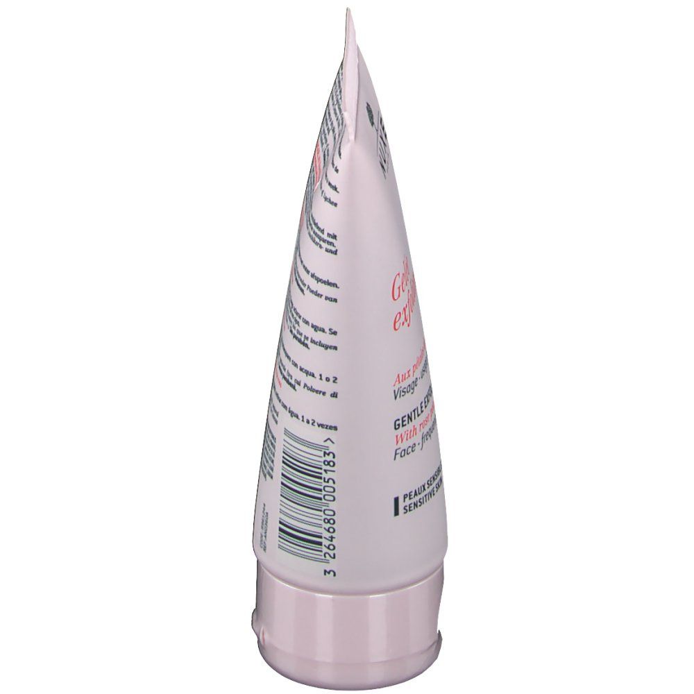 Vista laterale del tubo. Tubo rosa con testo. Gelée exfoliante douce. Gel esfoliante delicato con petali di rosa. Per pelli sensibili.