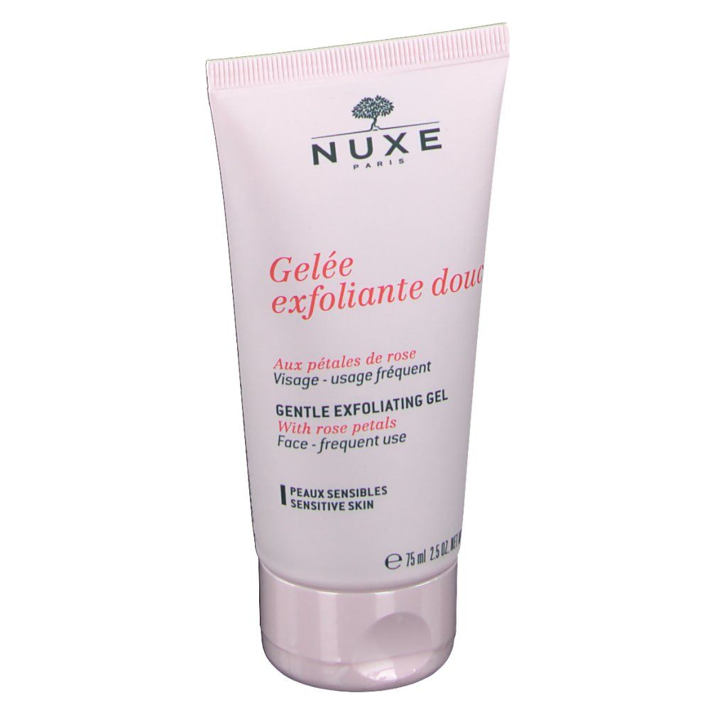 Tubo rosa con logo NUXE e testo. Gelée exfoliante douce. Gel esfoliante delicato con petali di rosa. Per pelli sensibili.