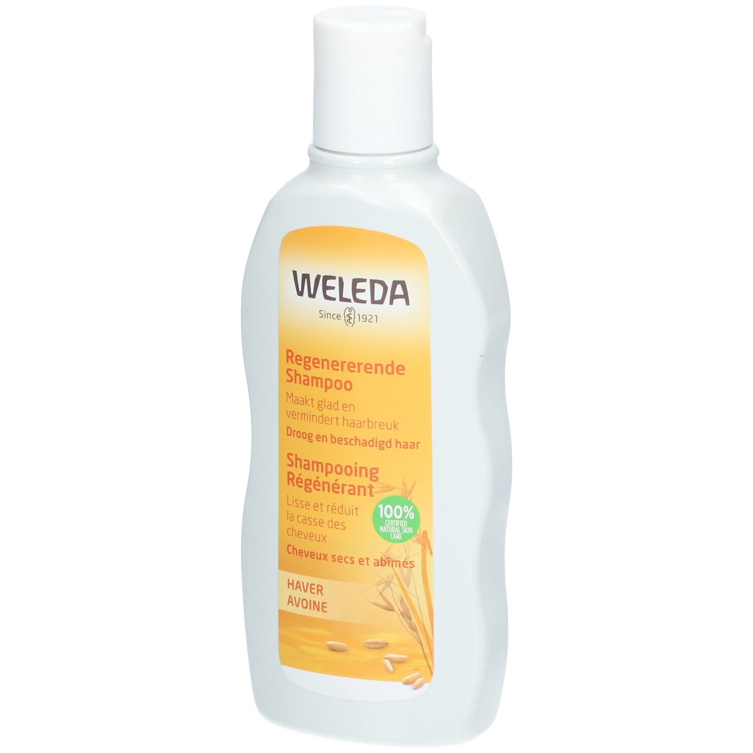 Weleda Shampoo Rigenerante. Bottiglia bianca con etichetta gialla. Testo: Shampoo Rigenerante, Avena, 100% naturale.