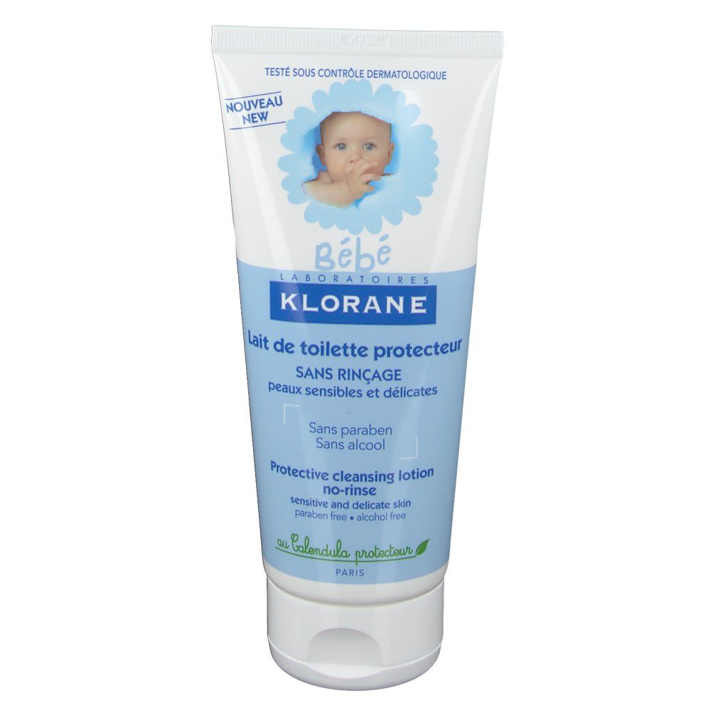 Tubo bianco e blu con illustrazione bambino e testo: Klorane Bébé, Lait de toilette protecteur. Senza risciacquo.