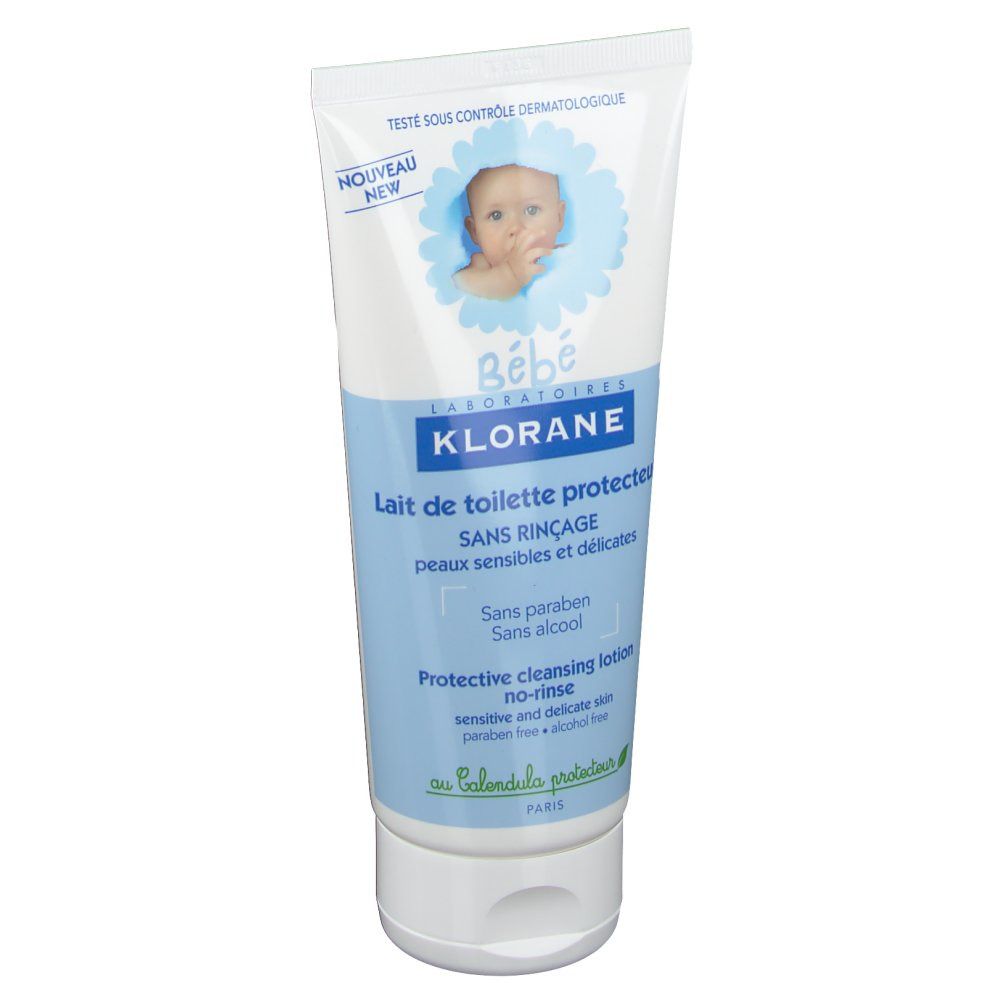 Tubo bianco e blu con illustrazione bambino e testo: Klorane Bébé, Lait de toilette protecteur. Senza risciacquo.