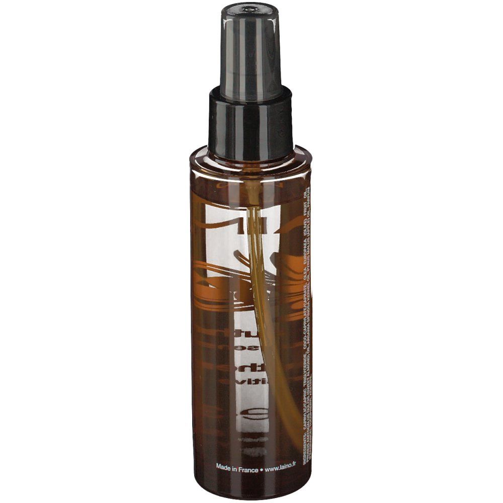 Flacone spray marrone con erogatore nero. Etichetta con informazioni sul prodotto. Scritta: LAINO, L'huile authentique.