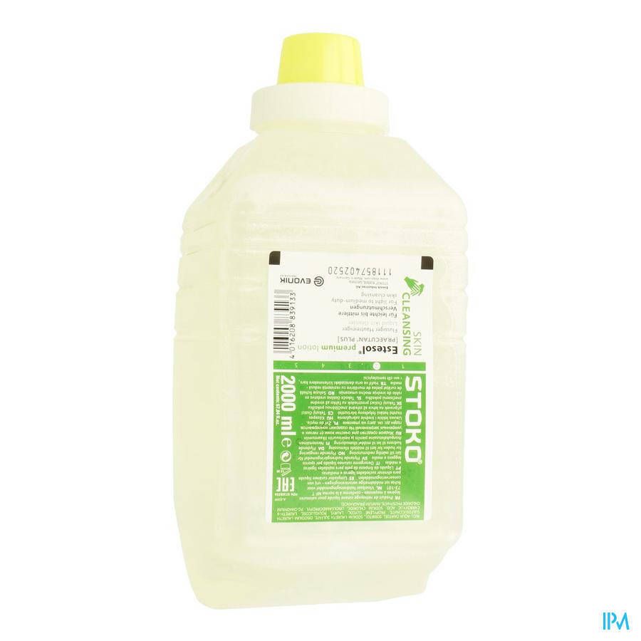 Contenitore di liquido giallastro. Scritta: Estesol Premium Skin Cleansing, STOKO, 2000 ml. Tappo giallo.