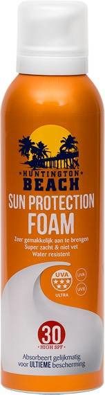 Flacone spray arancione con tappo bianco. Testo: Huntington Beach Sun Protection Foam, SPF 30, sigillo UVA.